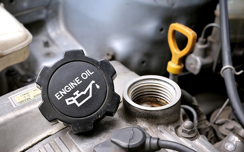 Close-up of engine oil cap in a car engine